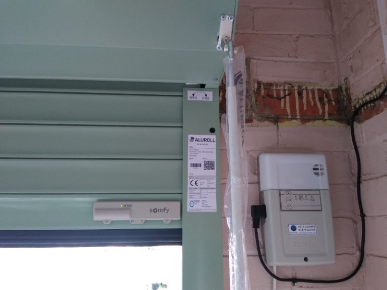 Double Green Roller Garage Door Installation - Blueberry Automation